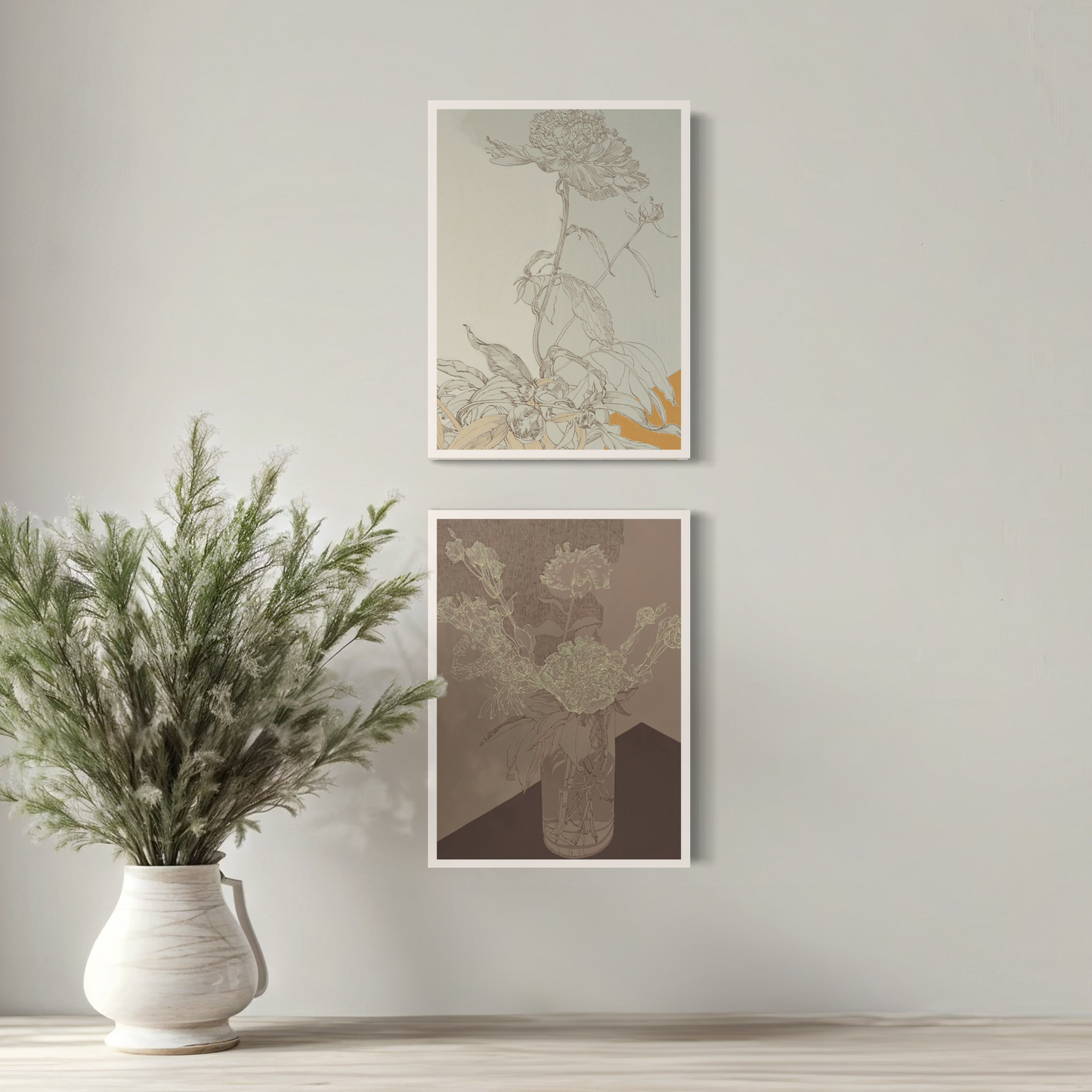Zwei Florale Mini-Poster im Rahmen an einer Wand mit Pflanze in einem Topf, stilvolle Dekoration für jedes Zuhause.