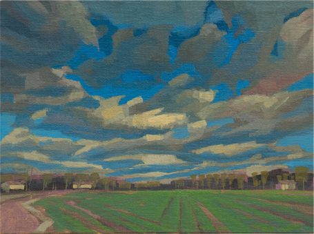 Wasserwerk, 20x15cm Blick über ein grünes Feld in warmen Farben unter einem expressiven Wolkenhimmel im Kleinformat